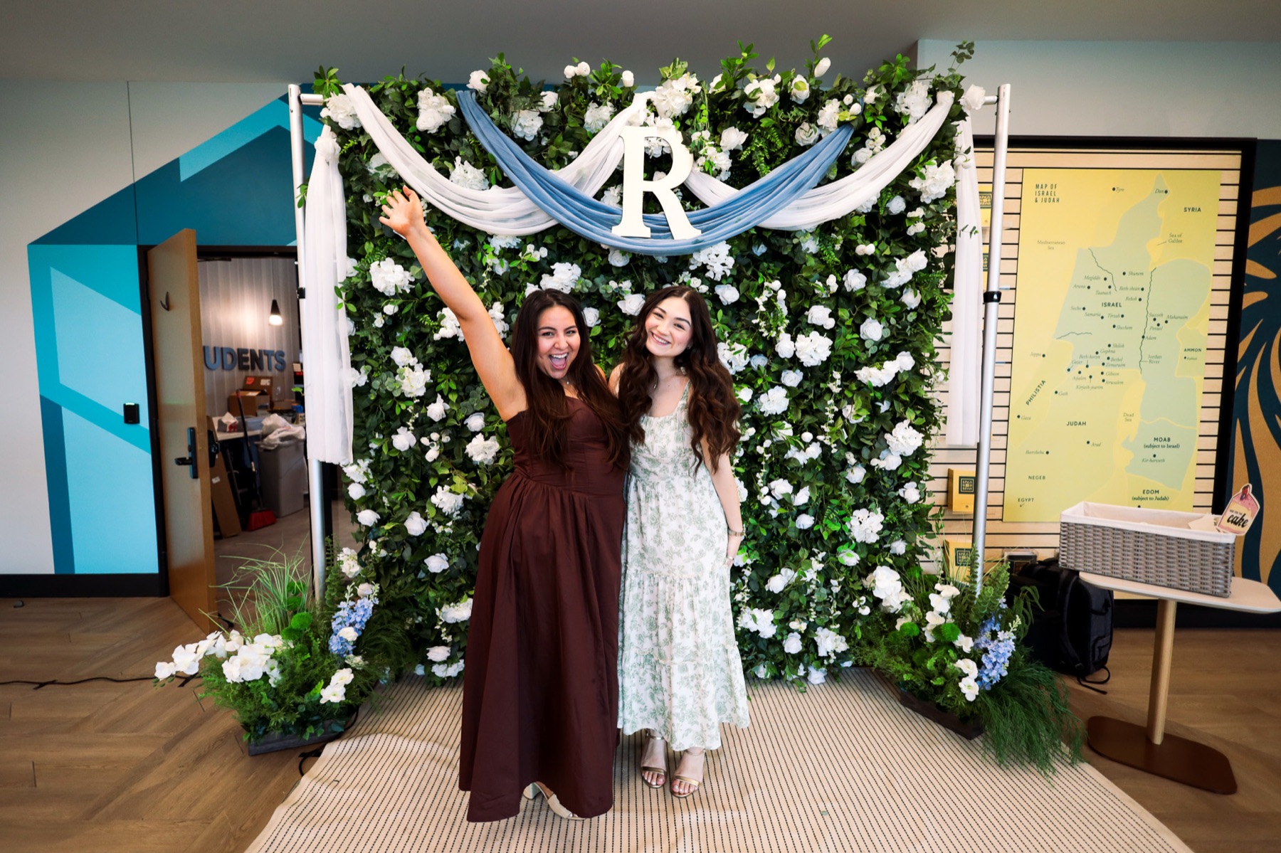 Friends posing at the photo booth