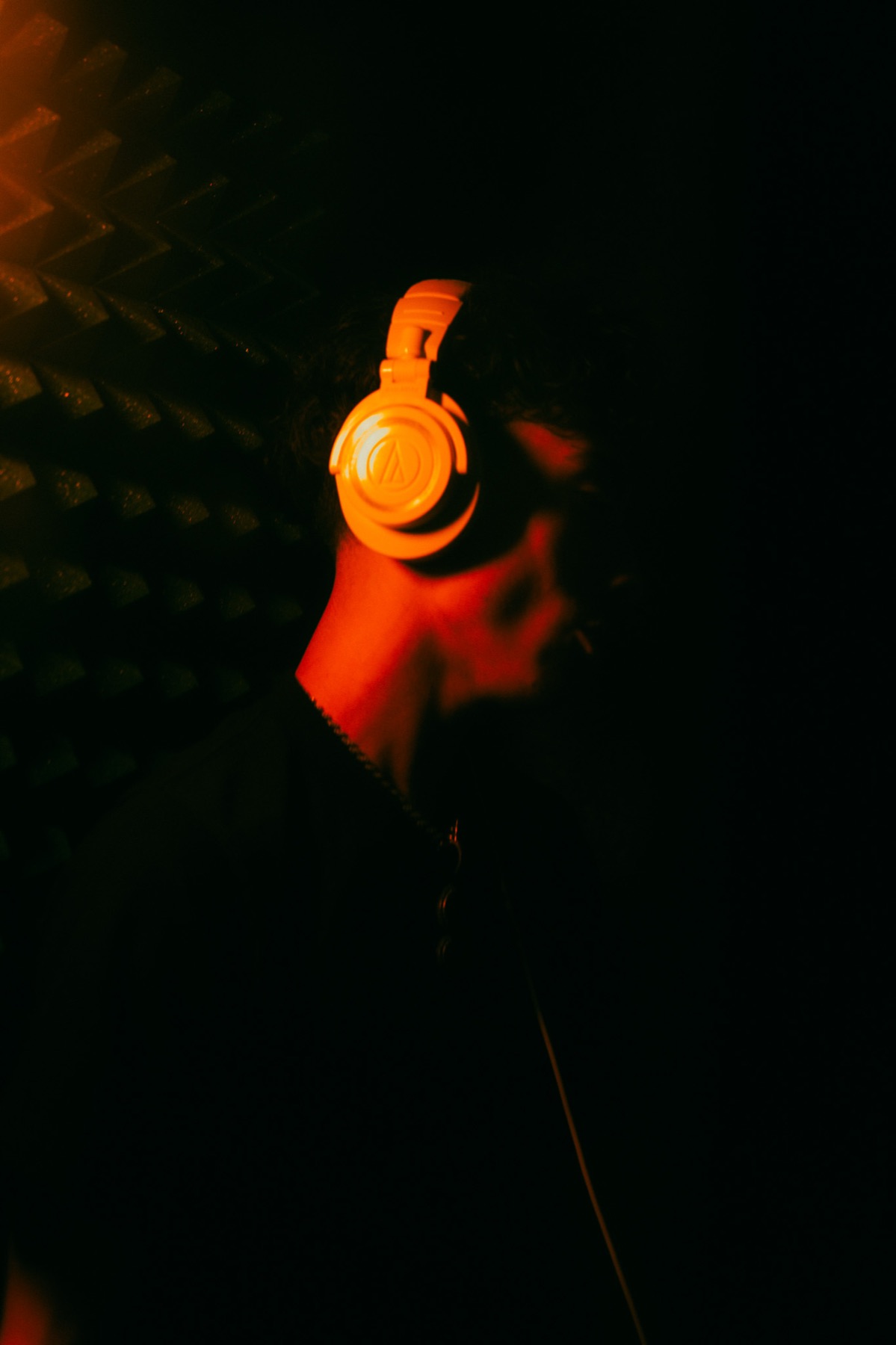 Studio portrait with headphones